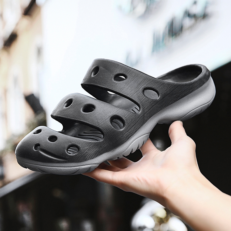 闽湘鞋业跨境新款凉拖鞋双密度双色一体成型工厂直销招分销洞洞鞋